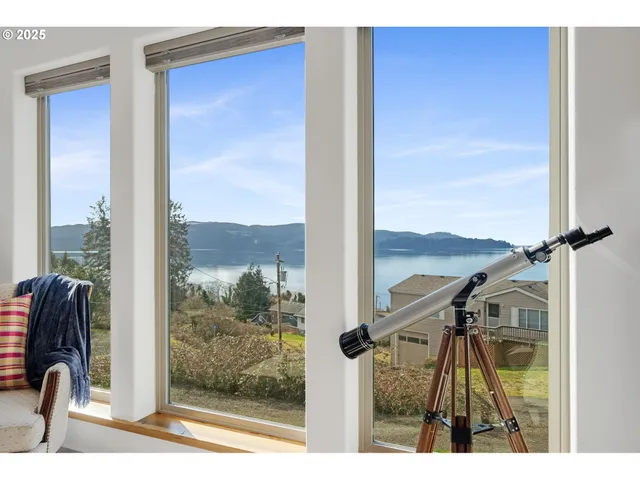 a view of a balcony with chair