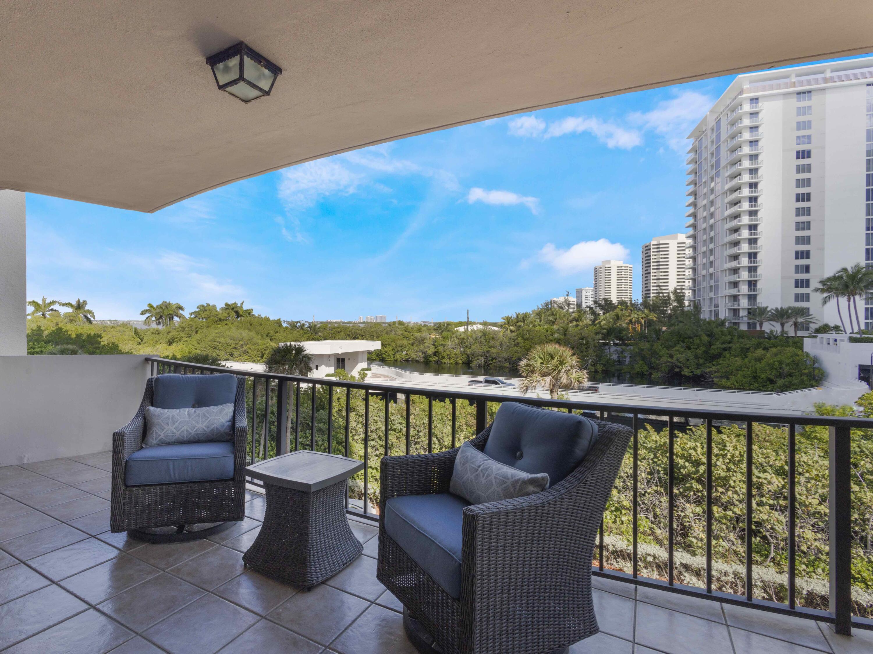 4200 North Ocean Drive, Unit 2301 Singer Island, FL 33404 - Photo 11 of 52 a view of roof deck with couches and wooden floor