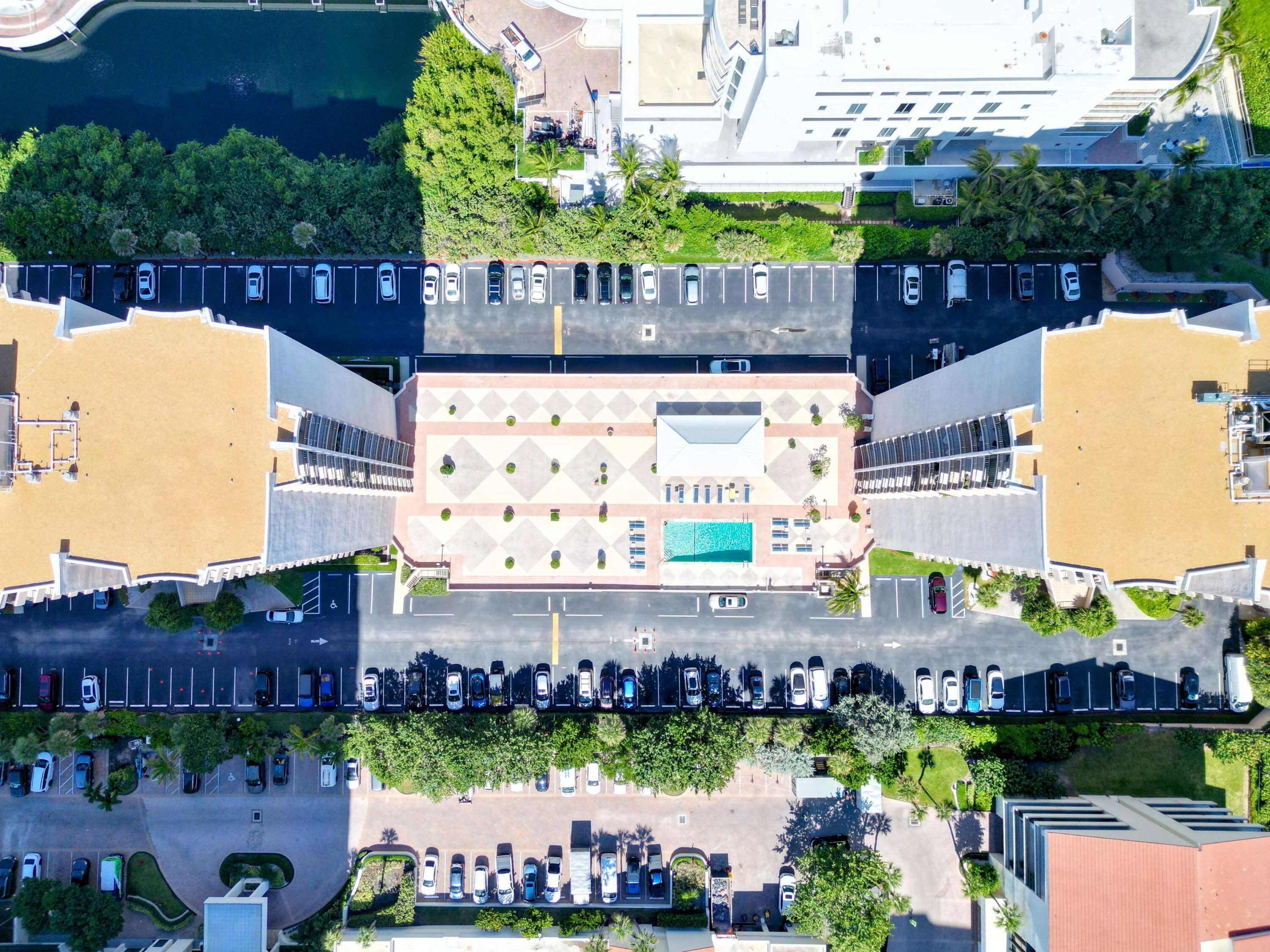 4200 North Ocean Drive, Unit 2301 Singer Island, FL 33404 - Photo 51 of 52 an aerial view of a house with a garden and a swimming pool