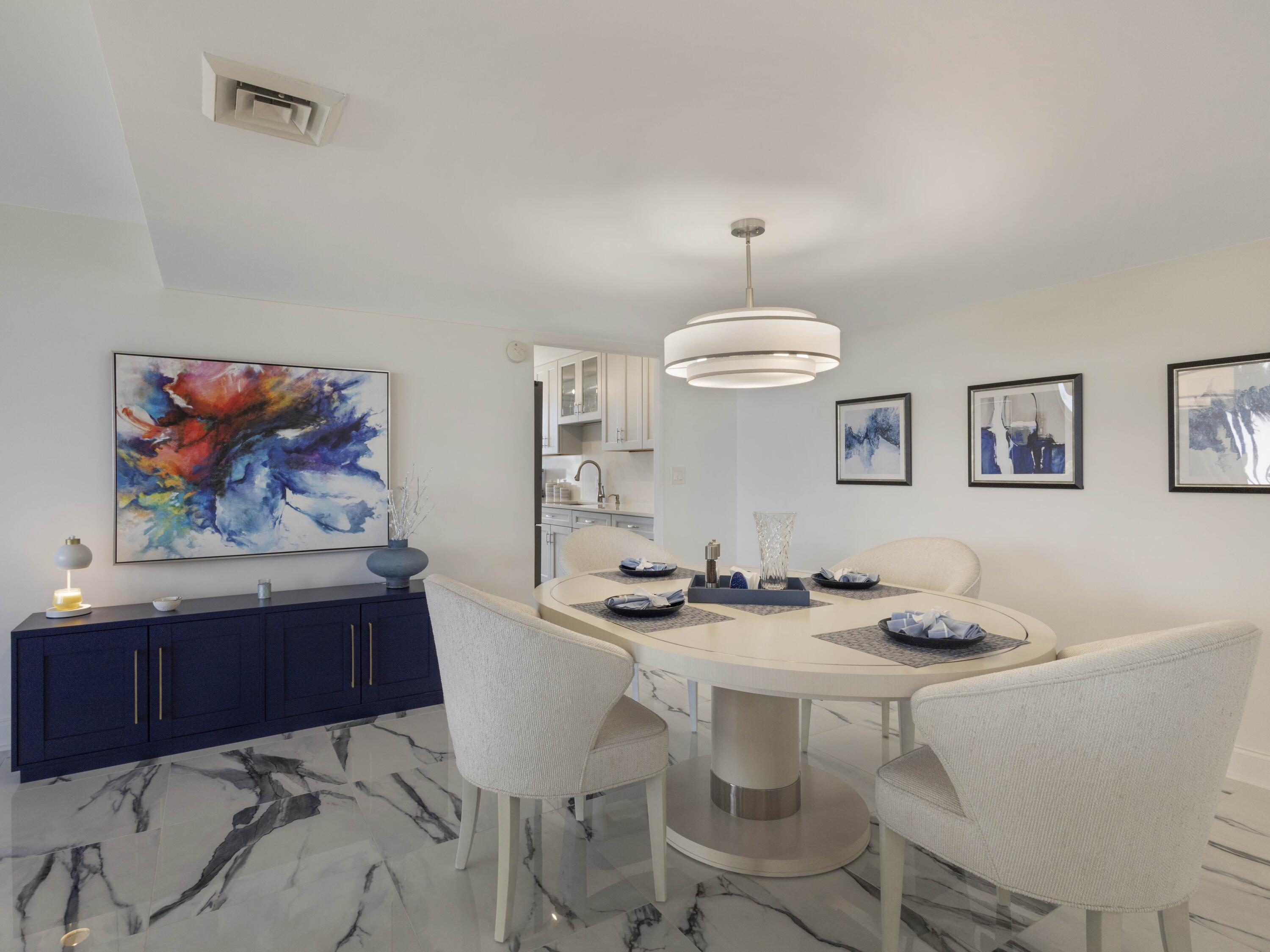 4200 North Ocean Drive, Unit 2301 Singer Island, FL 33404 - Photo 6 of 52 a dining room with furniture and window