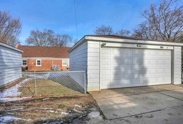 a view of a house with a garage