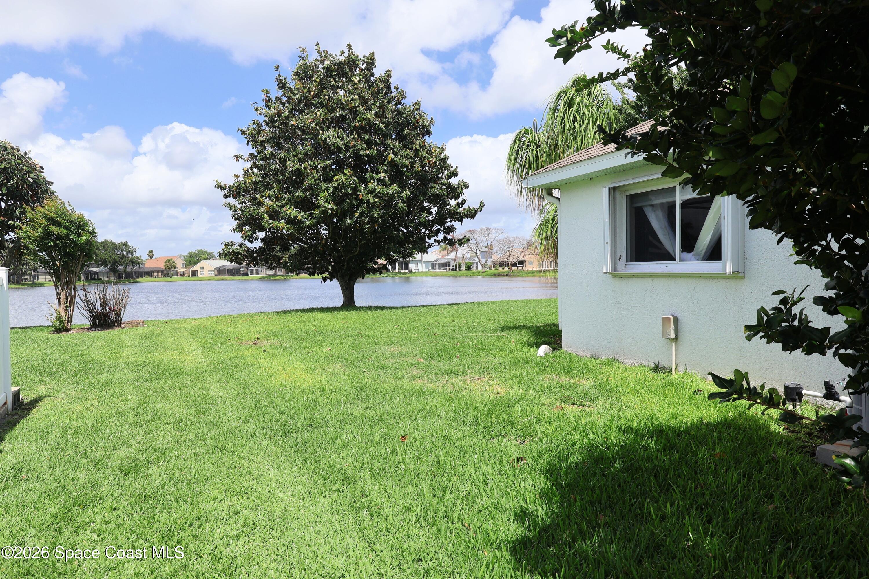 704 Carriage Hill Road Melbourne, FL 32940 - Photo 5 of 59 Pond