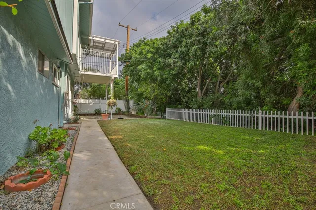 a view of a garden with a small yard