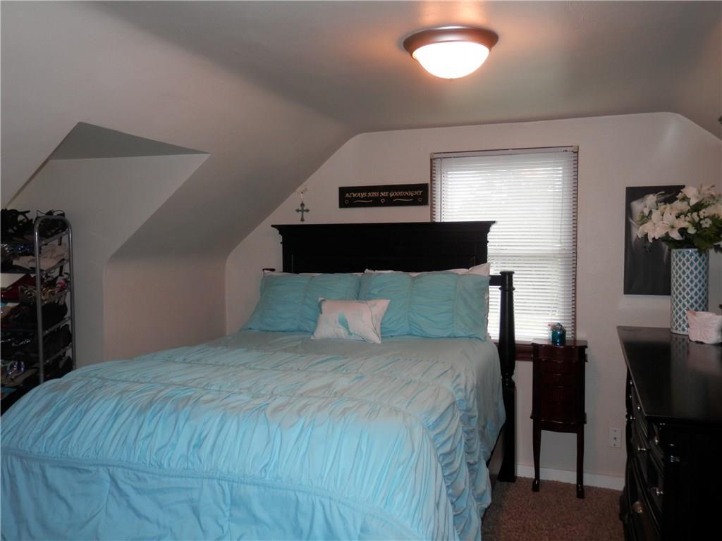 5575 Brownsville Road Pittsburgh, PA 15236 - Photo 17 of 25 Upstairs bedroom #1 (features access to storage area behind door)