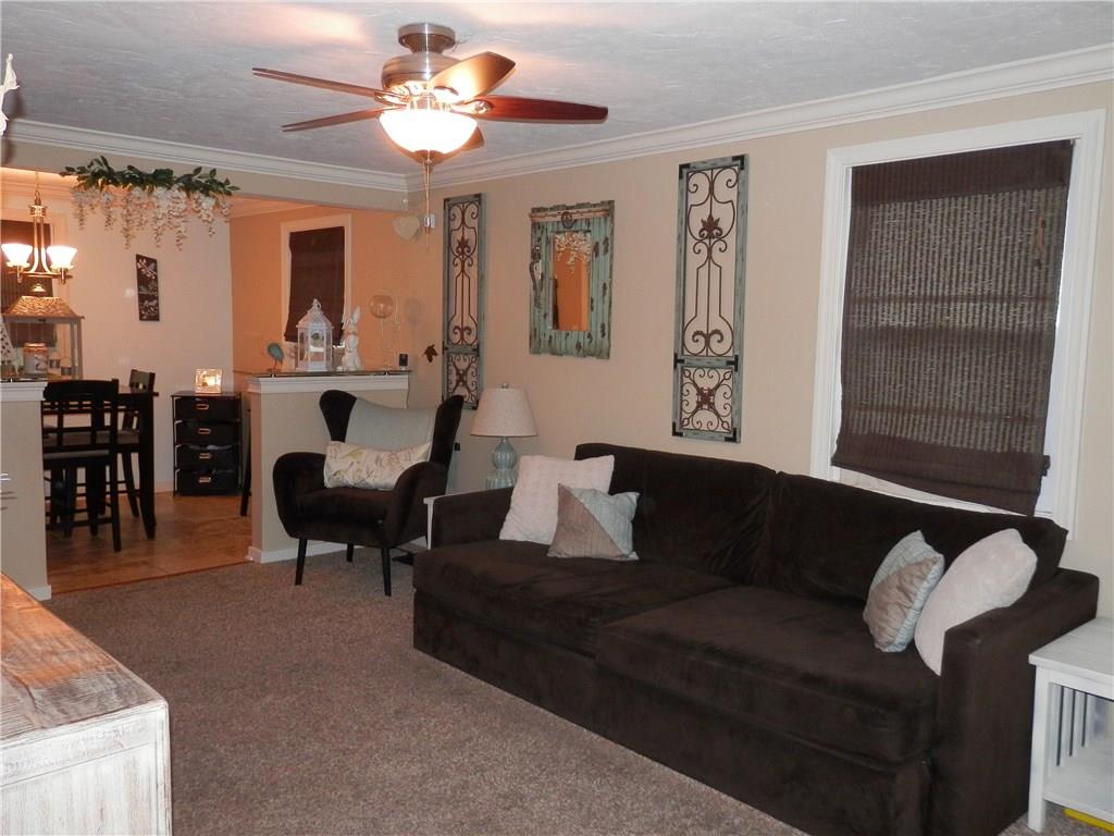 5575 Brownsville Road Pittsburgh, PA 15236 - Photo 3 of 25 Living room opens into dining area.