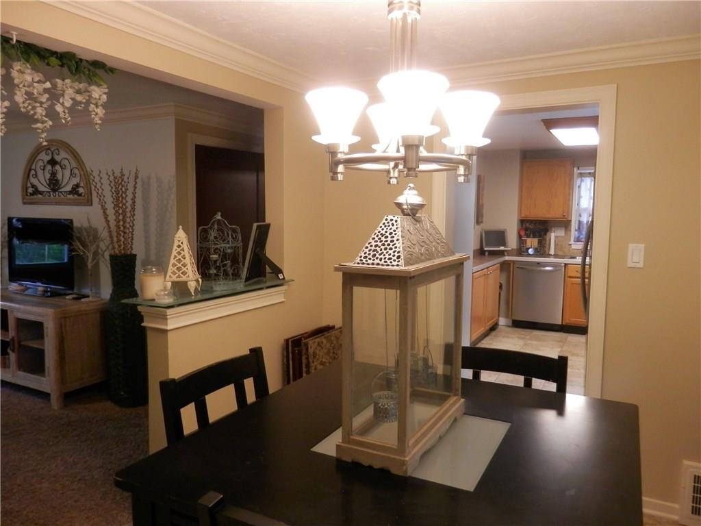 5575 Brownsville Road Pittsburgh, PA 15236 - Photo 6 of 25 View from the dining area into the living room and kitchen.