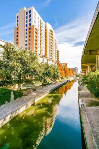 a view of swimming pool with outdoor space and seating area