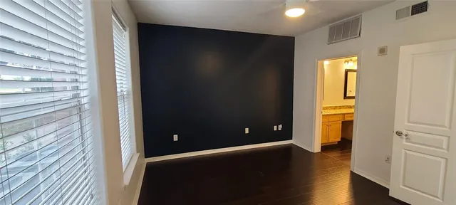 a view of hallway with kitchen