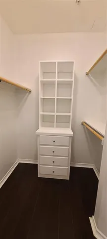 a kitchen with stainless steel appliances granite countertop a refrigerator and a stove