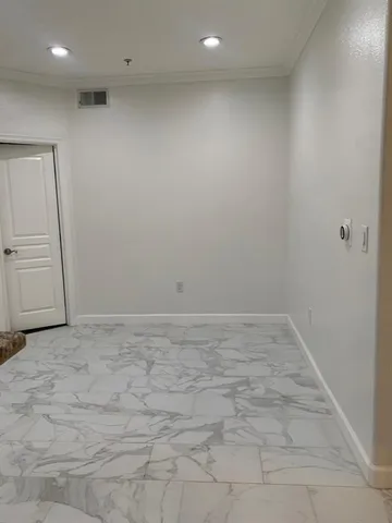 a view of a bathroom sink and a mirror