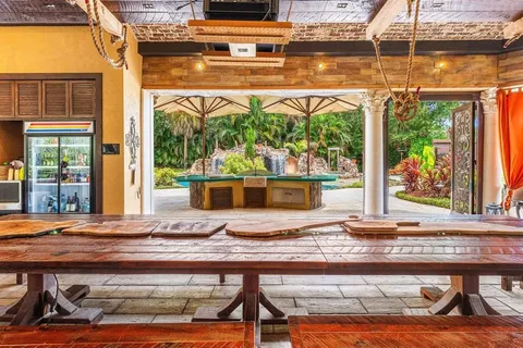 a kitchen with stainless steel appliances granite countertop a stove and a sink