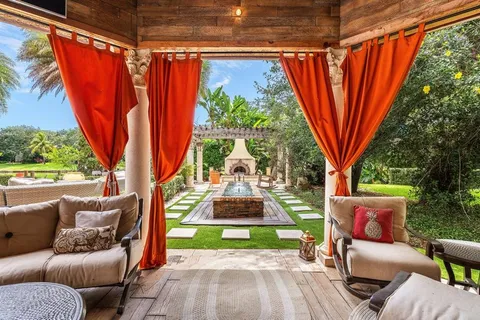 a view of a front of house with a garden