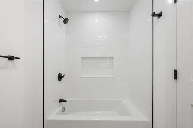 a bathroom with a bathtub
