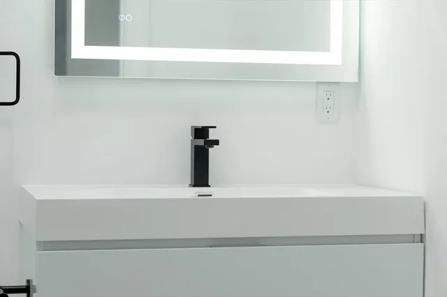 a close view of a bathtub in the bathroom