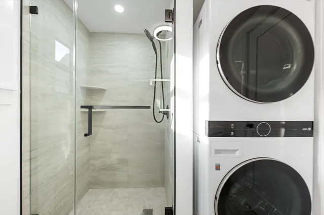 a utility room with dryer and washer