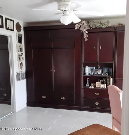 a view of a livingroom with furniture and chandelier
