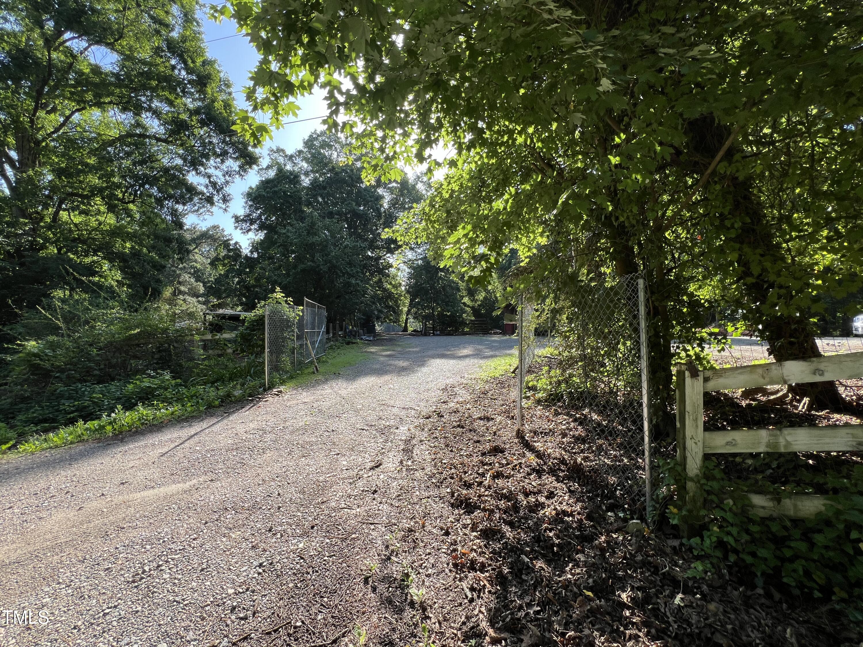 12932 Ghoston Road Wake Forest, NC 27587 - Photo 14 of 22 a view of backyard with green space