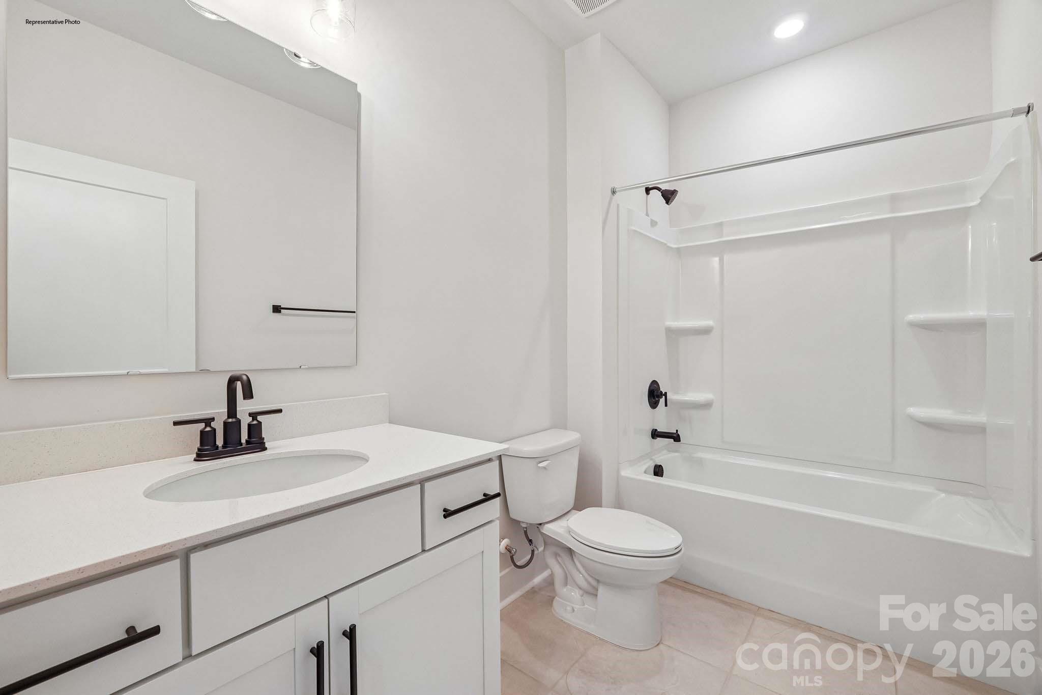 541 Mahogany Road York, SC 29745 - Photo 14 of 32 a bathroom with a sink toilet a shower and a mirror