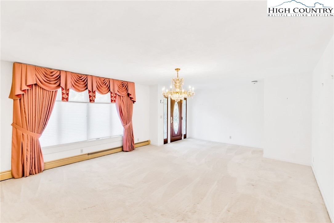 354 Old Wilkes Road Jefferson, NC 28640 - Photo 13 of 50 a view of an empty room