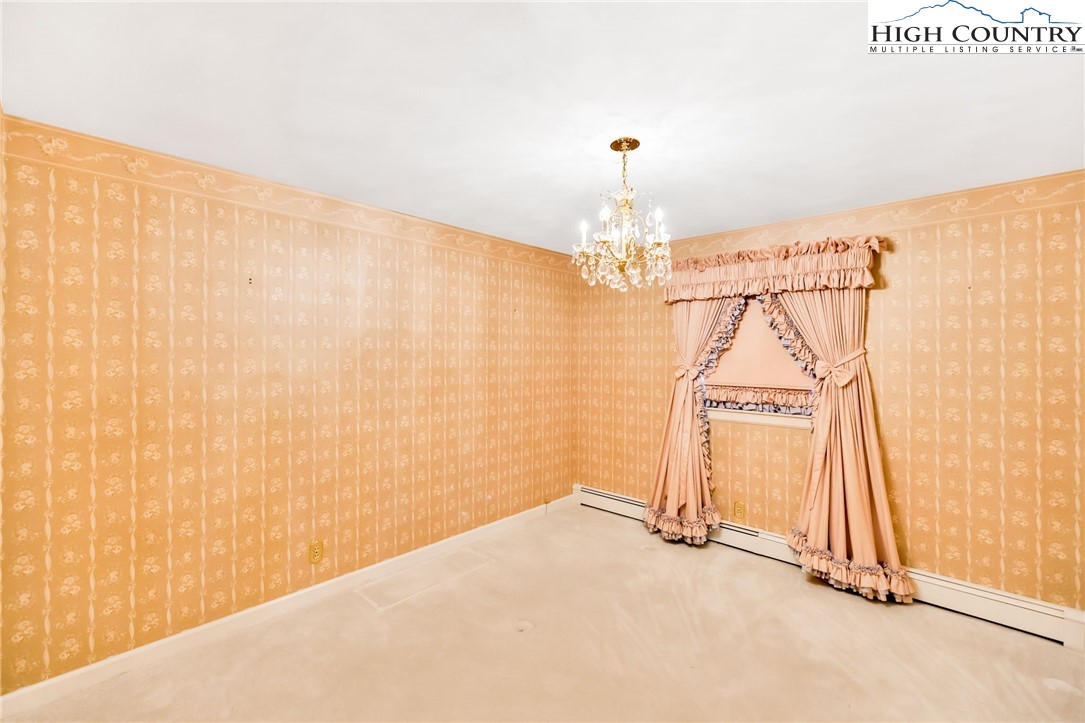 354 Old Wilkes Road Jefferson, NC 28640 - Photo 20 of 50 a view of a room with a window