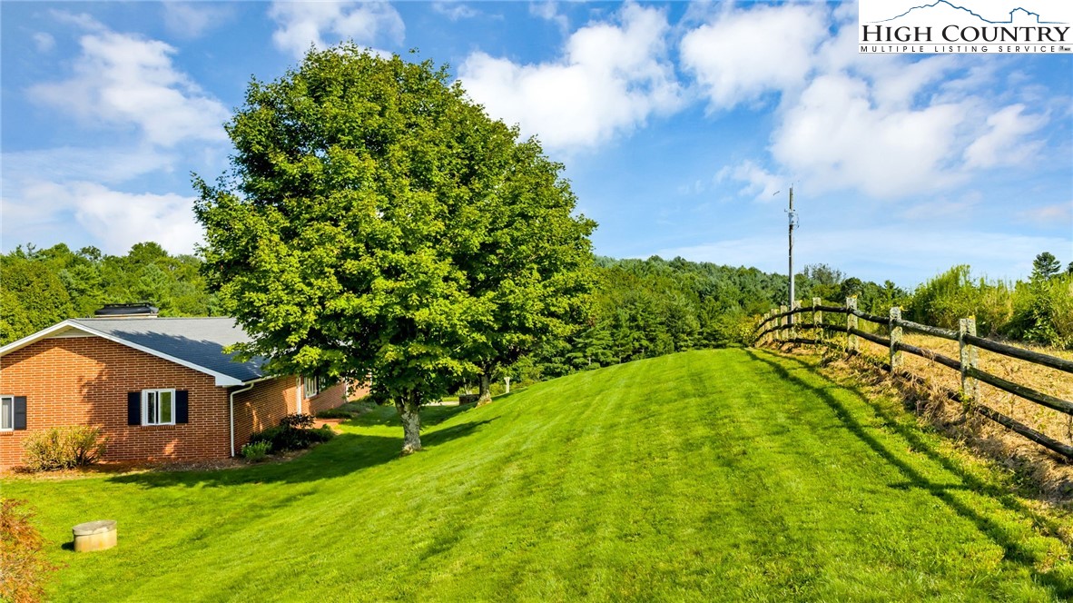 354 Old Wilkes Road Jefferson, NC 28640 - Photo 26 of 50 a view of back yard of the house