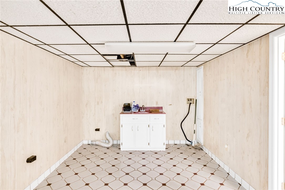 354 Old Wilkes Road Jefferson, NC 28640 - Photo 38 of 50 a bathroom with a sink and a shower