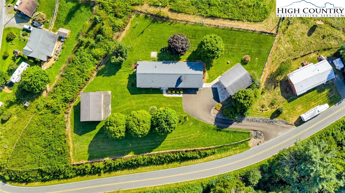 354 Old Wilkes Road Jefferson, NC 28640 - Photo 50 of 50 an aerial view of a house with a garden