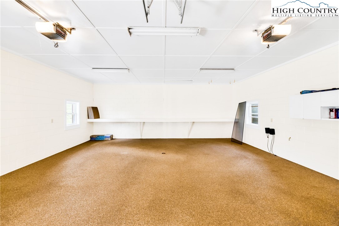 354 Old Wilkes Road Jefferson, NC 28640 - Photo 7 of 50 a view of a room with racks on the wall