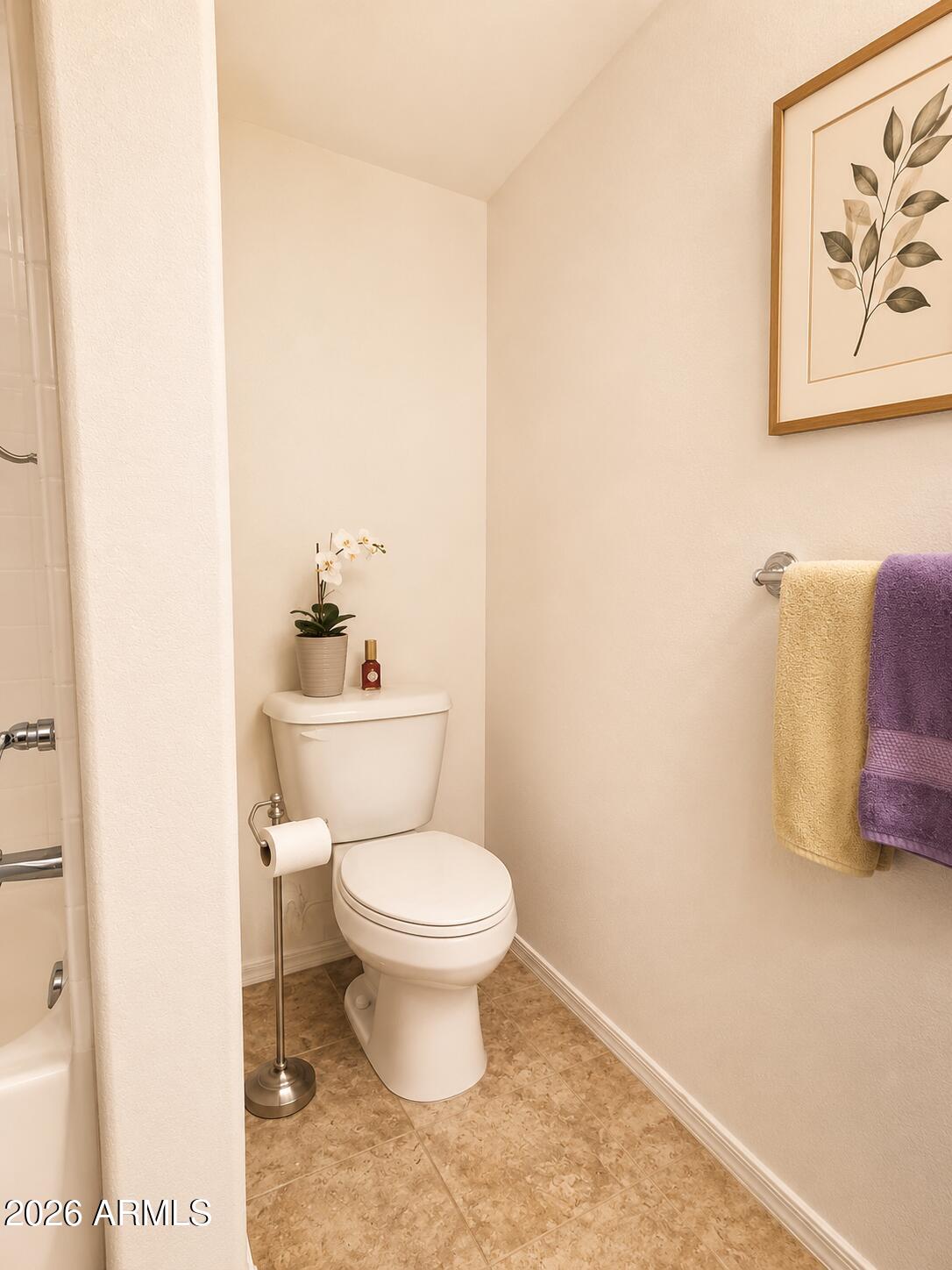 2150 West Alameda Road, Unit 1020 Phoenix, AZ 85085 - Photo 31 of 35 a bathroom with a toilet sink and vanity