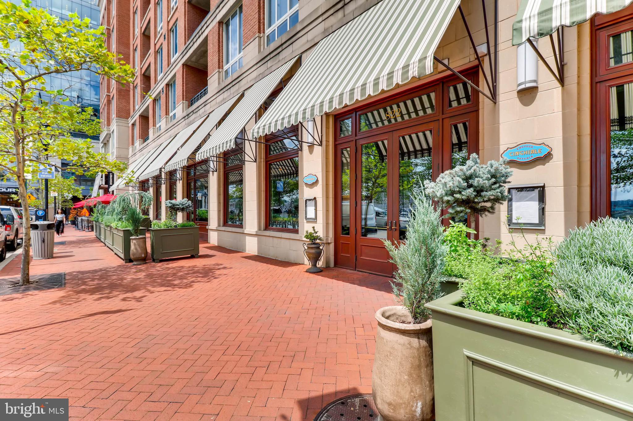 675 President Street, Unit 1806 Baltimore, MD 21202 - Photo 31 of 46 a view of a building with potted plants