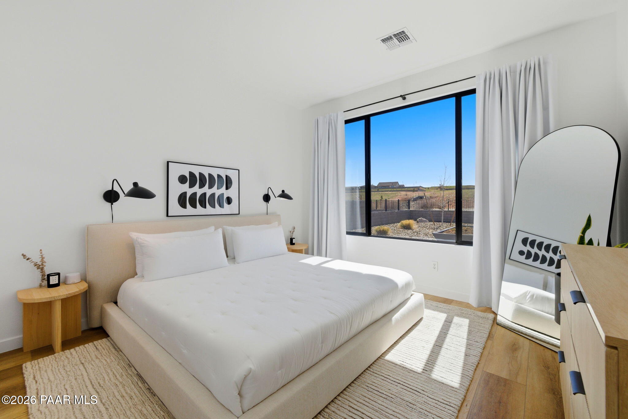 5994 East Killen Loop Prescott Valley, AZ 86314 - Photo 11 of 119 a bedroom with a large bed and a window