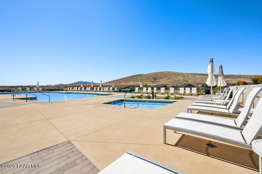 5994 East Killen Loop Prescott Valley, AZ 86314 - Photo 115 of 119 a view of a swimming pool and lounge chair