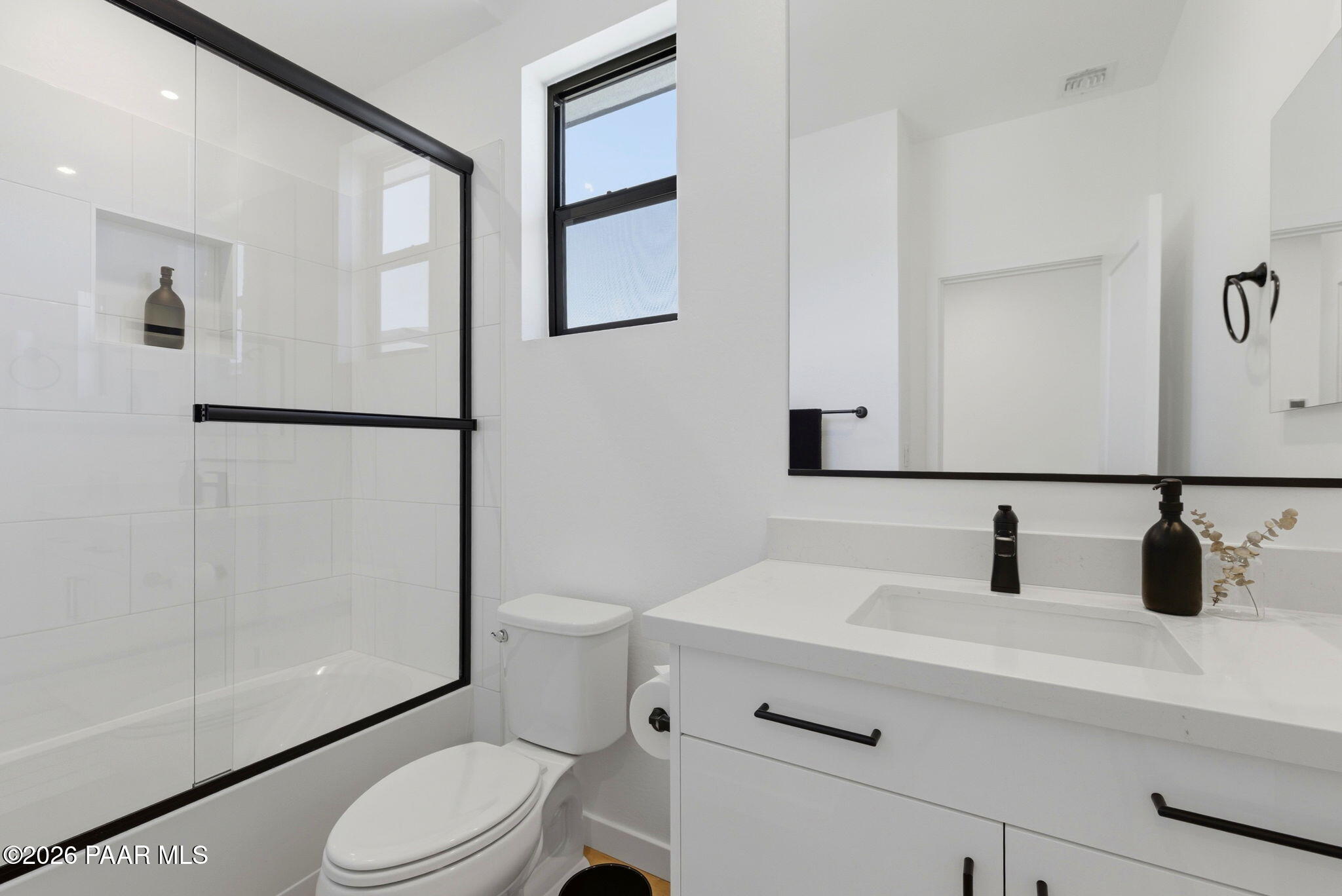 5994 East Killen Loop Prescott Valley, AZ 86314 - Photo 16 of 119 a bathroom with a sink a toilet a vanity and mirror