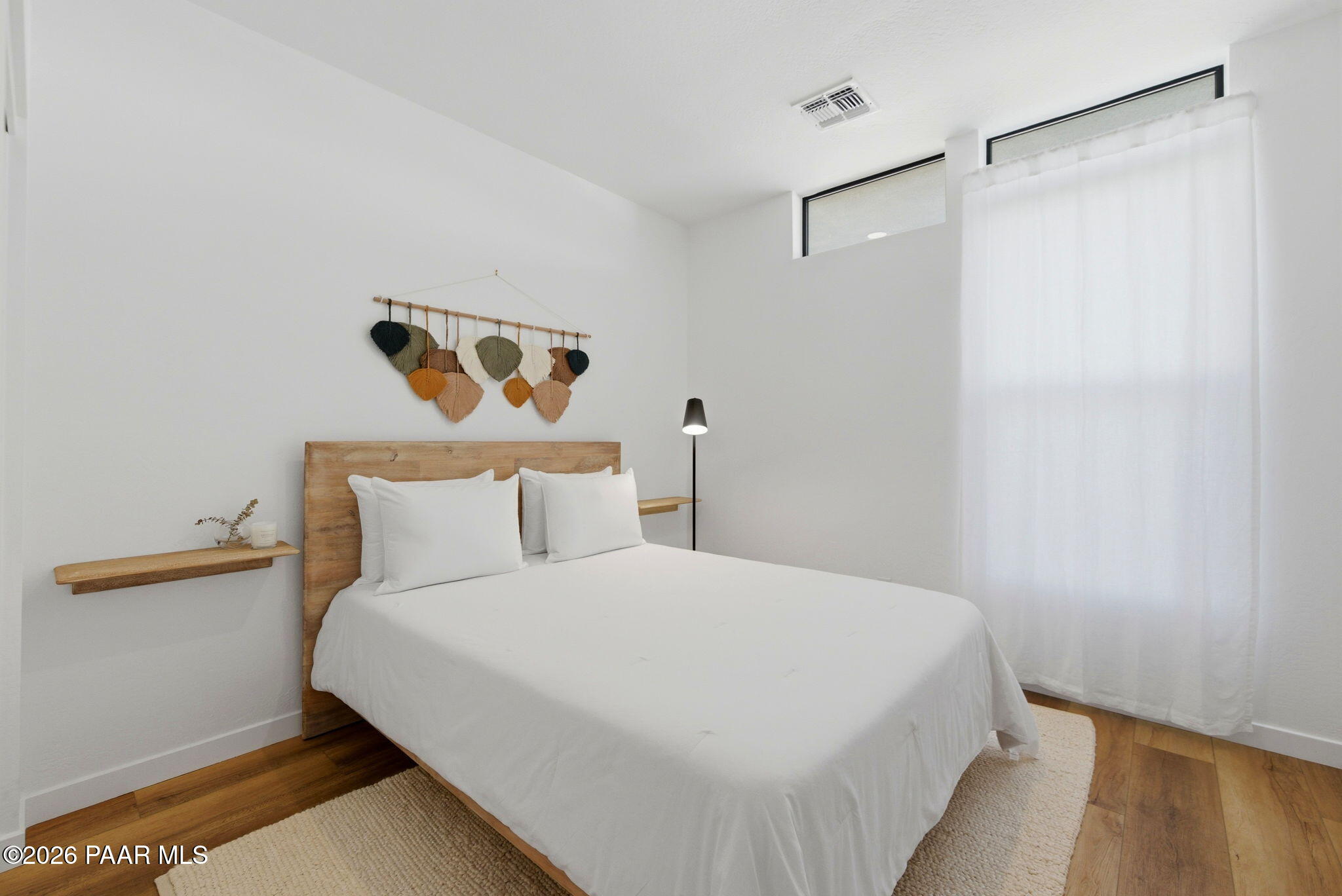 5994 East Killen Loop Prescott Valley, AZ 86314 - Photo 17 of 119 a bedroom with a bed and a window