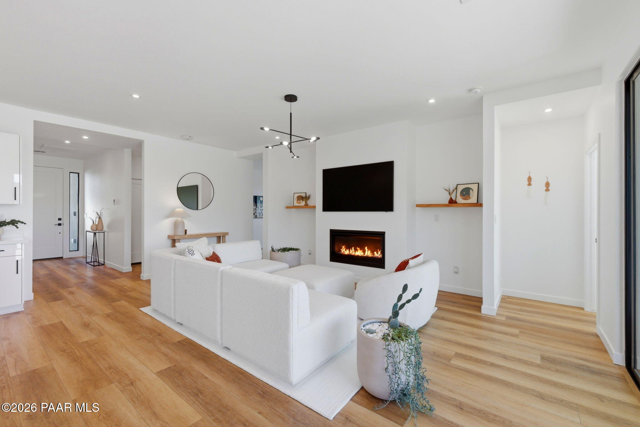 5994 East Killen Loop Prescott Valley, AZ 86314 - Photo 4 of 119 a living room with furniture and a flat screen tv