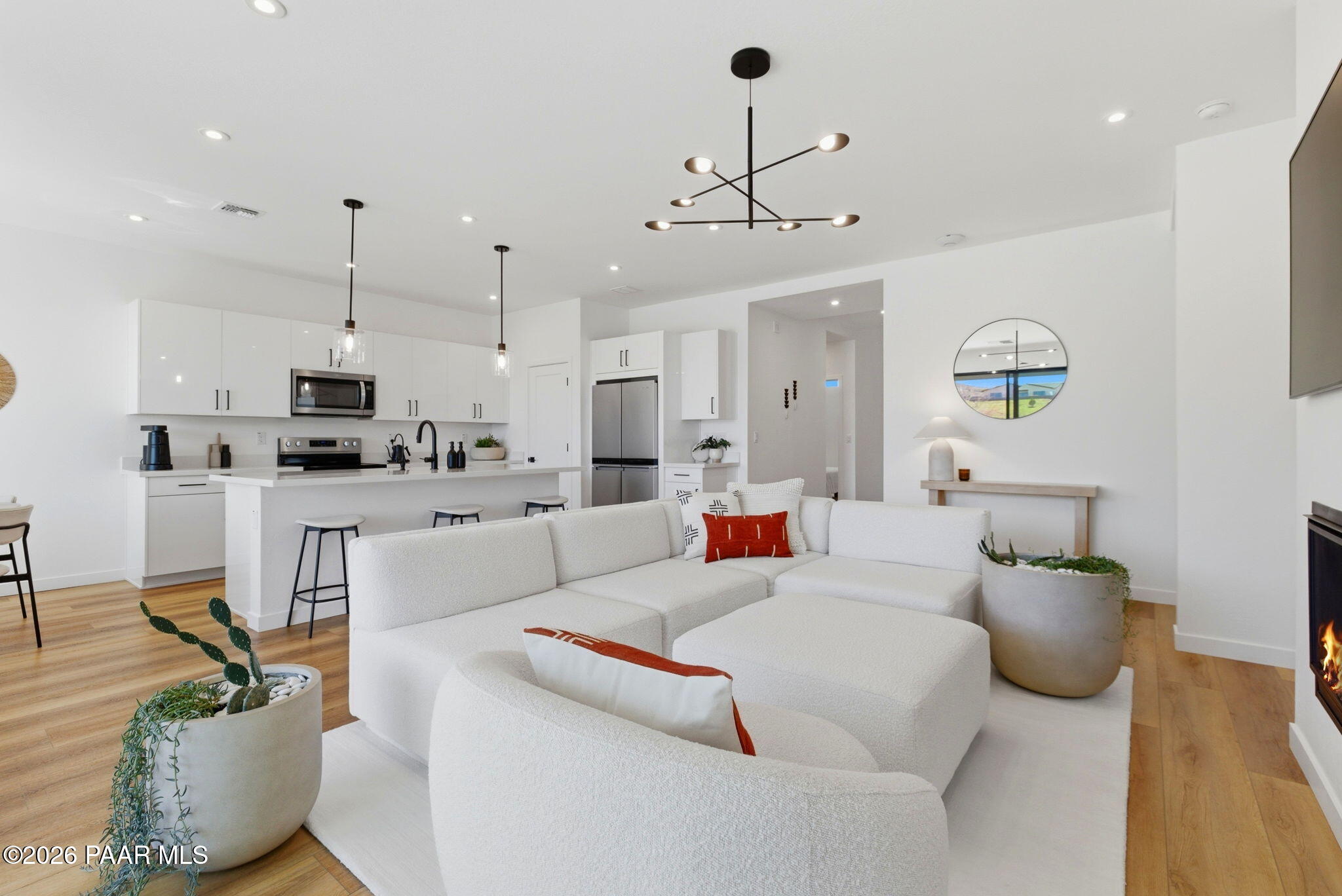 5994 East Killen Loop Prescott Valley, AZ 86314 - Photo 6 of 119 a living room with furniture and a chandelier