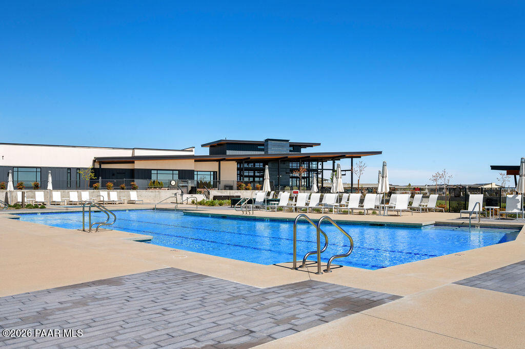 5994 East Killen Loop Prescott Valley, AZ 86314 - Photo 83 of 119 a view of a swimming pool with seating space