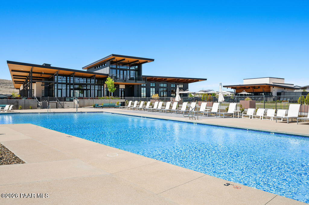 5994 East Killen Loop Prescott Valley, AZ 86314 - Photo 91 of 119 a view of a swimming pool with an outdoor seating