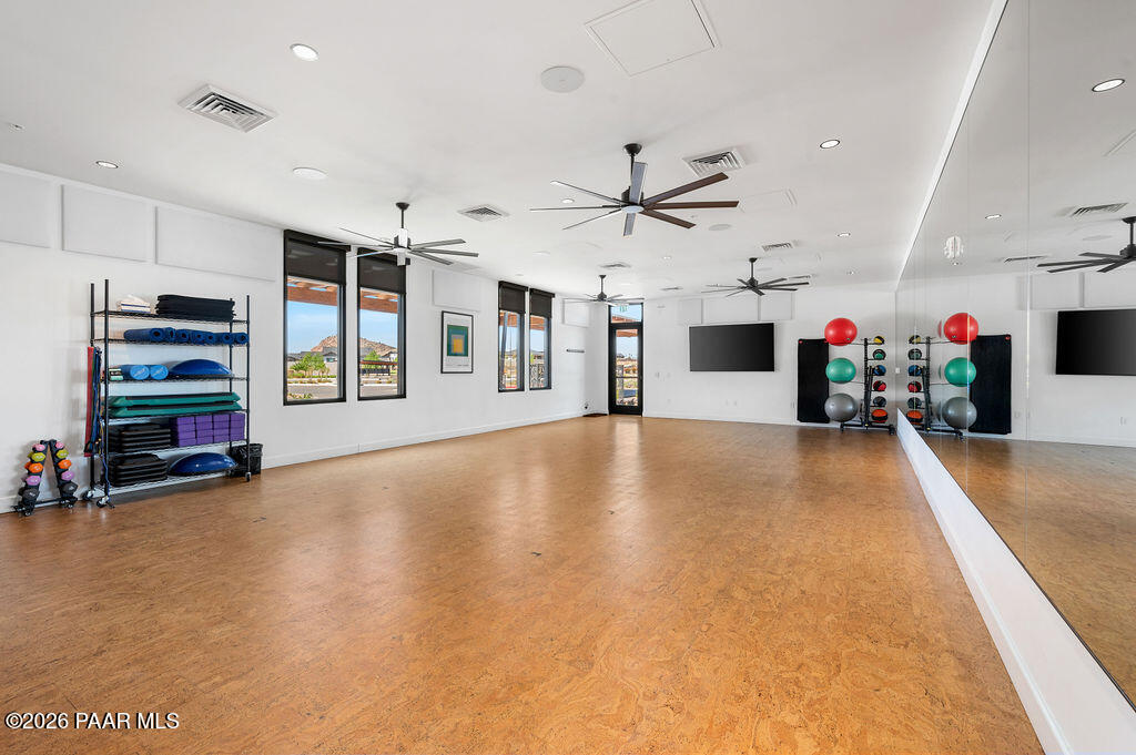 5994 East Killen Loop Prescott Valley, AZ 86314 - Photo 98 of 119 a view of a livingroom with furniture and a flat screen tv