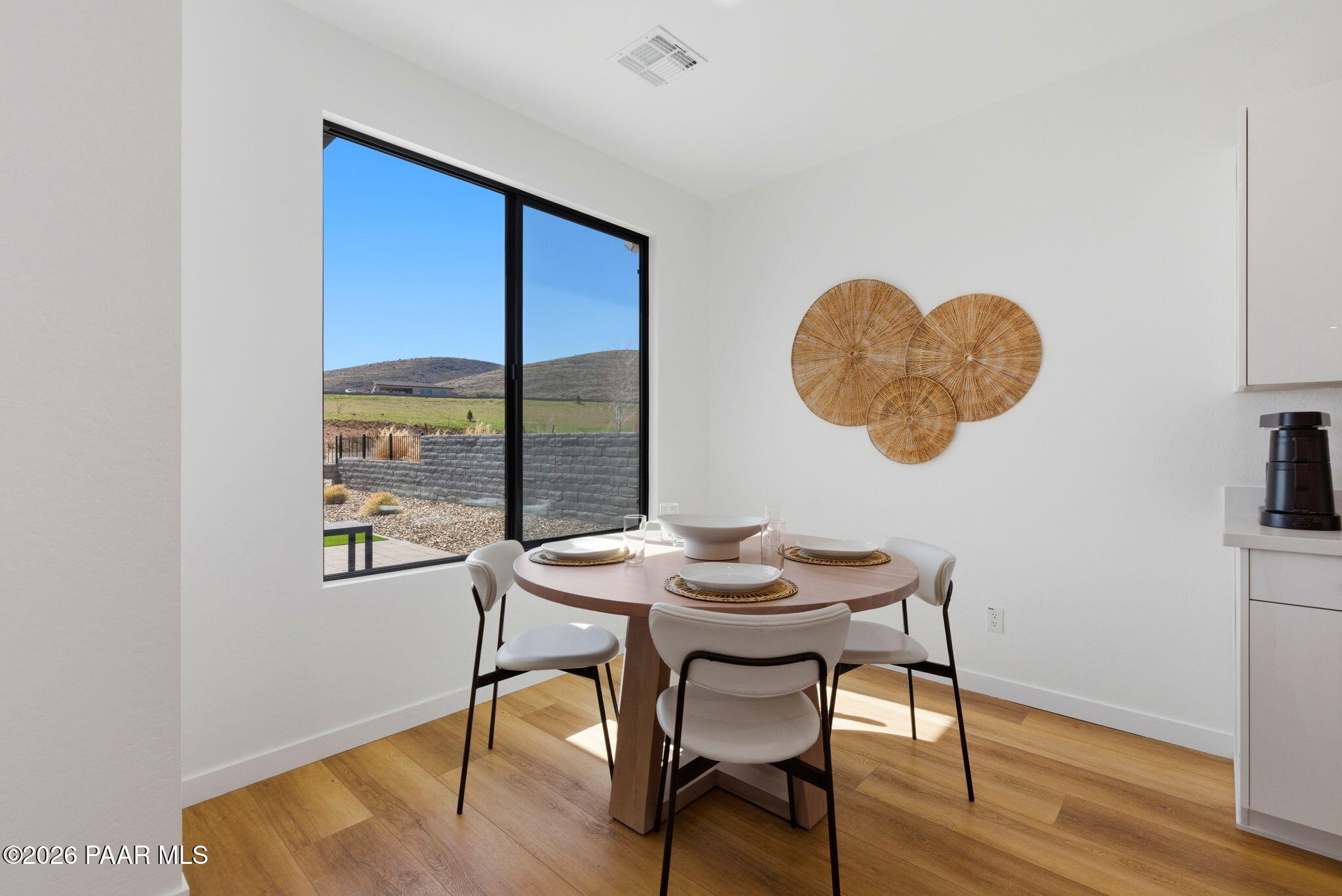 5994 East Killen Loop Prescott Valley, AZ 86314 - Photo 10 of 119 a view of a dining room with furniture and wooden floor