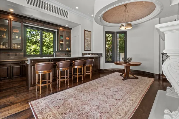 a very nice looking dining room with a large window