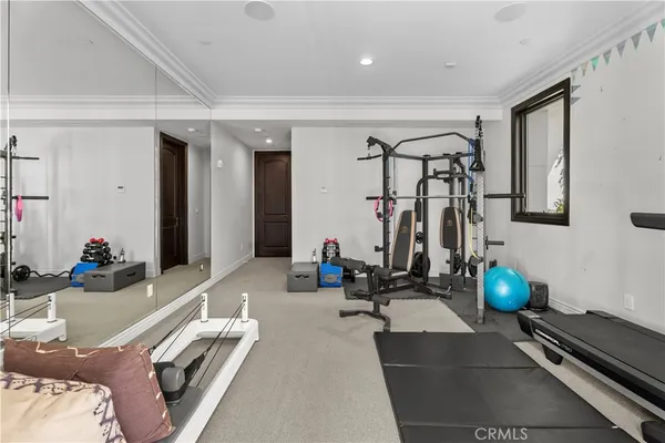 a view of a room with gym equipment