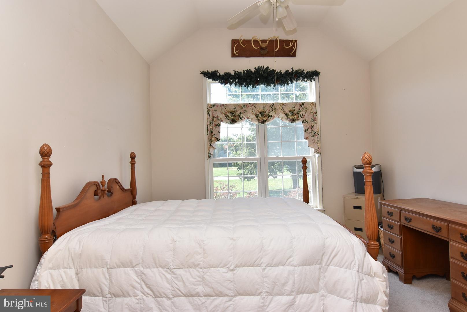 30849 Old Landing Road Laurel, DE 19956 - Photo 17 of 27 a bedroom with a bed and window