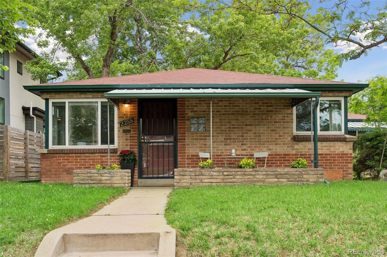 2255 Meade Street Denver, CO 80211 - Photo 2 of 30 a view of a house with a yard