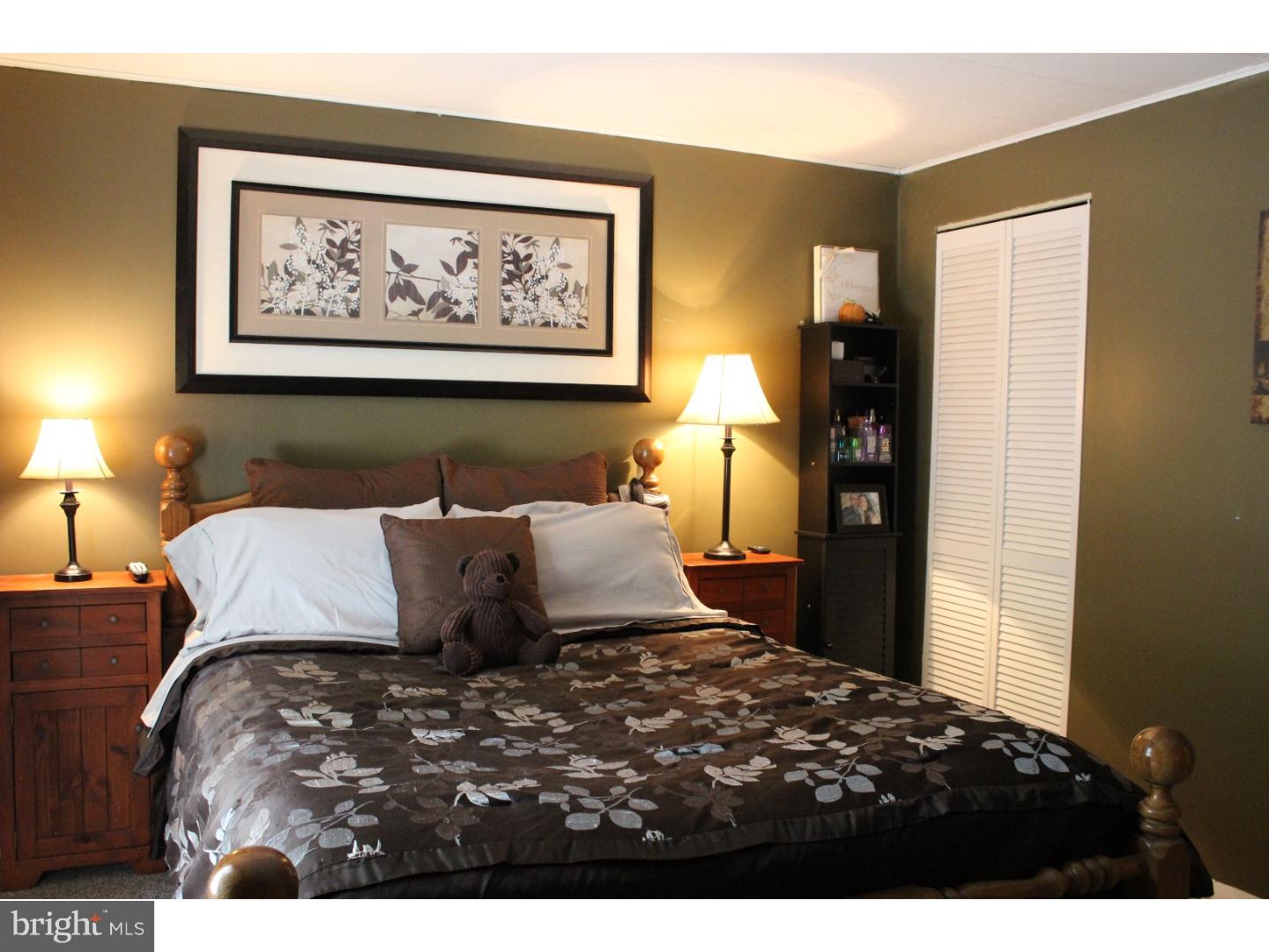 109 Prospect Road Sicklerville, NJ 08081 - Photo 17 of 20 a bedroom with a bed and a painting on the wall