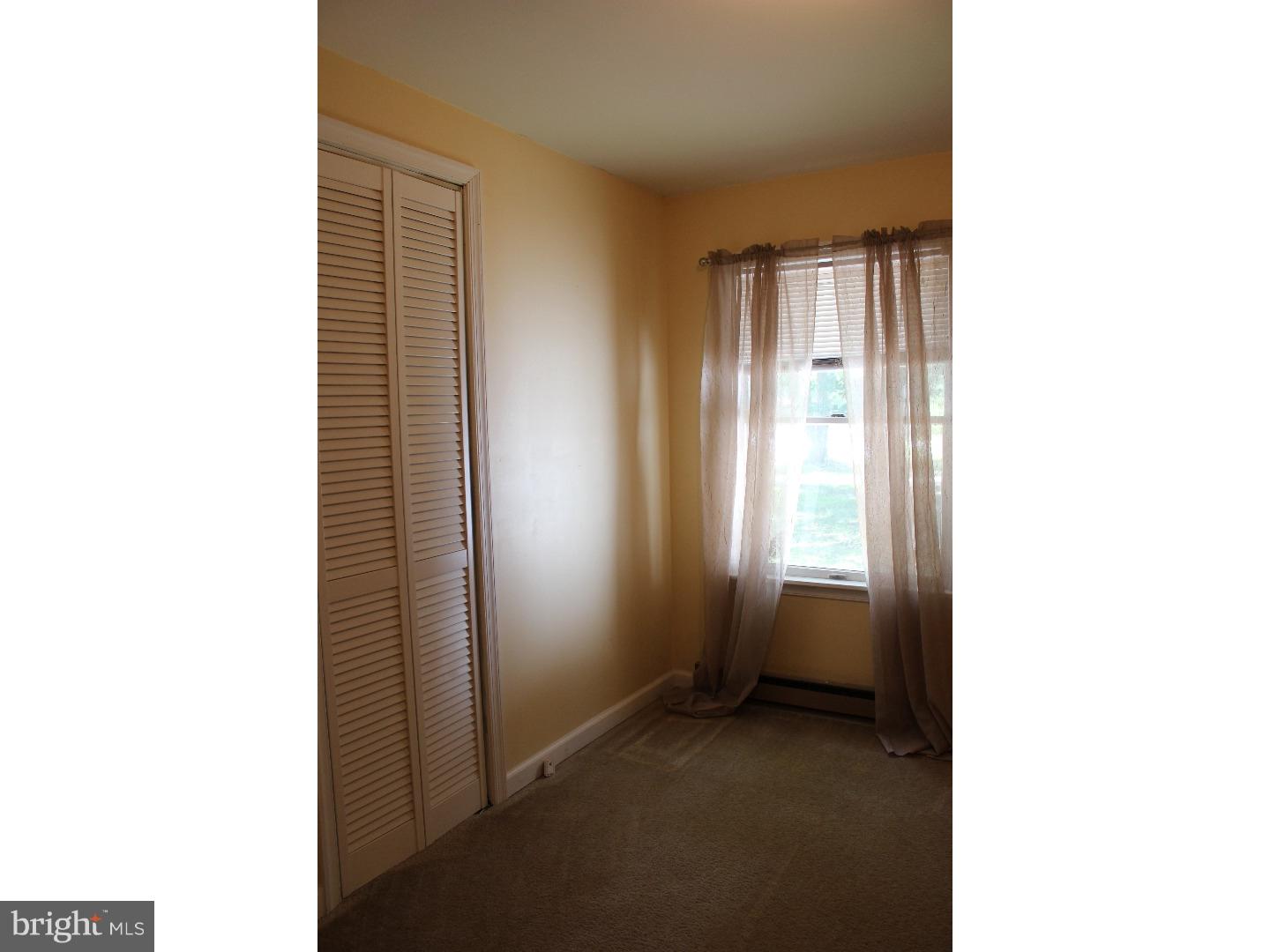 109 Prospect Road Sicklerville, NJ 08081 - Photo 20 of 20 a view of an empty room with closet and a window