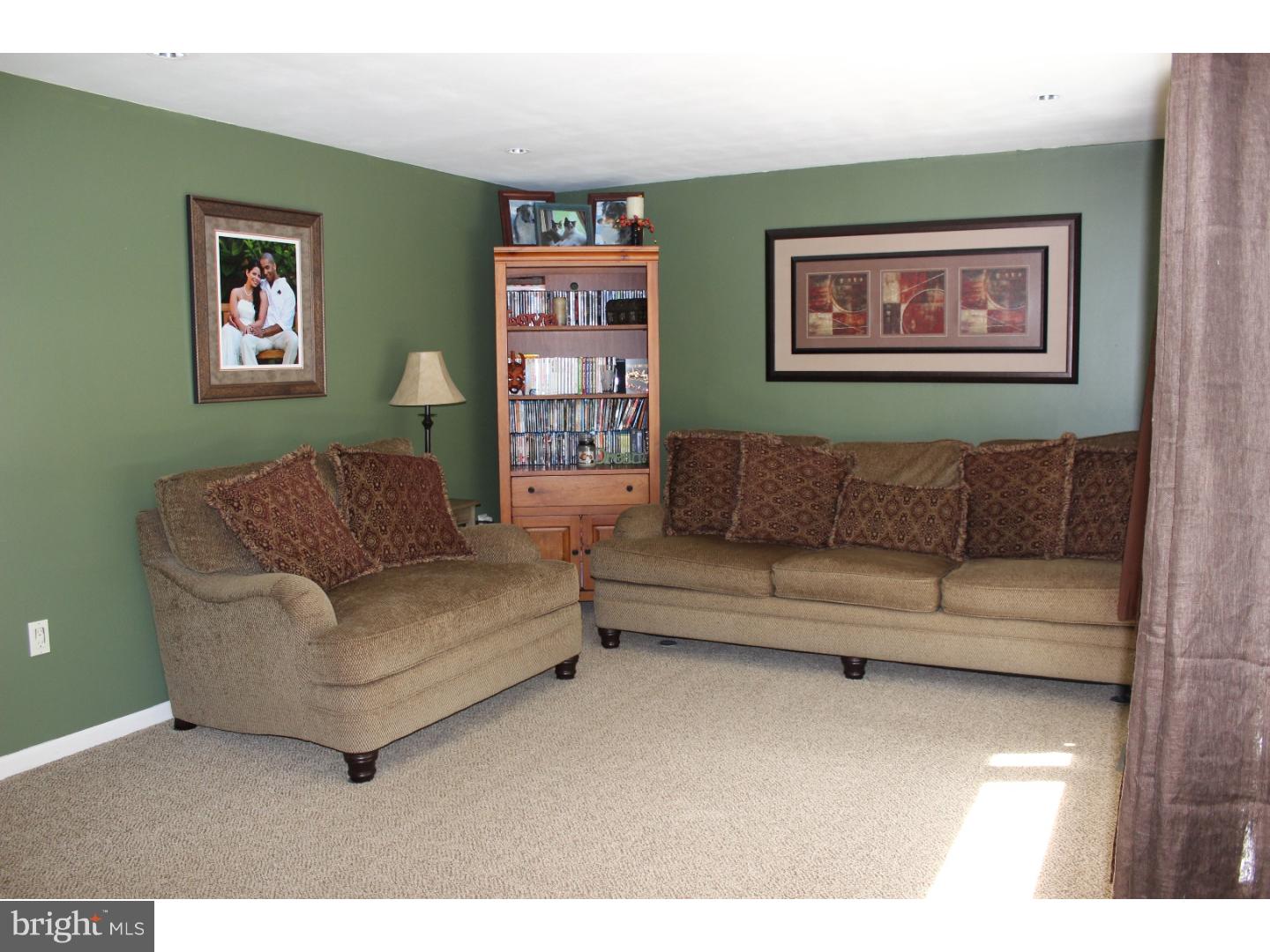 109 Prospect Road Sicklerville, NJ 08081 - Photo 5 of 20 a living room with furniture and a wall painting