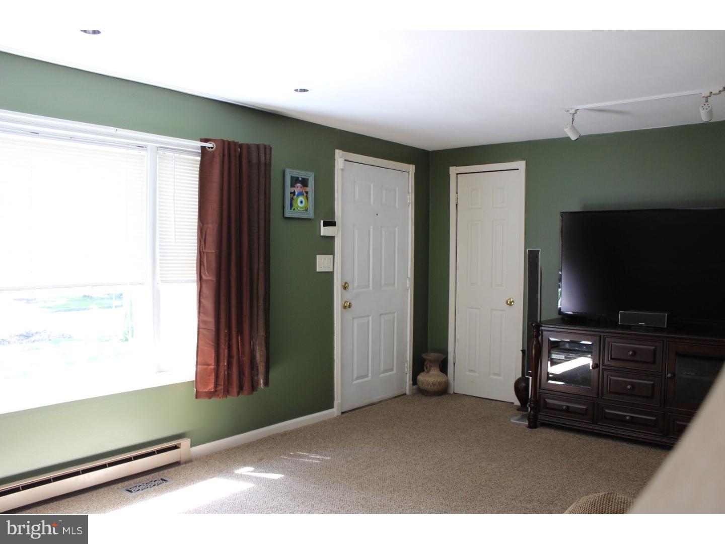109 Prospect Road Sicklerville, NJ 08081 - Photo 6 of 20 a living room with furniture and a flat screen tv