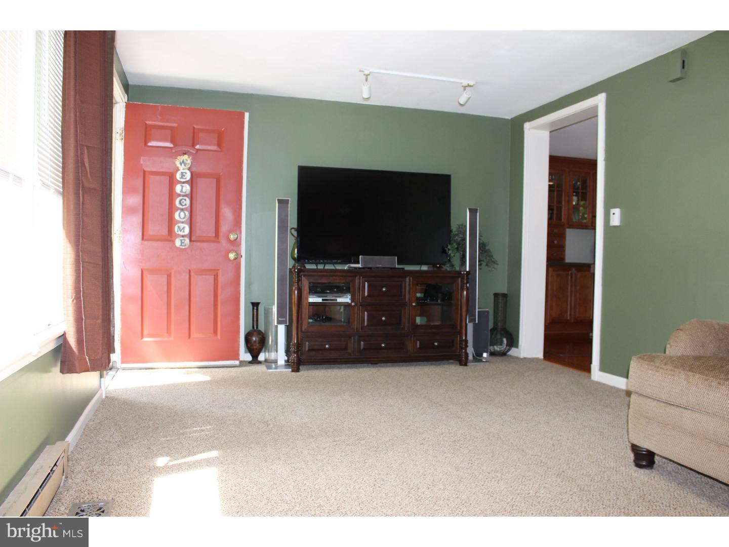 109 Prospect Road Sicklerville, NJ 08081 - Photo 7 of 20 a living room with furniture and a flat screen tv