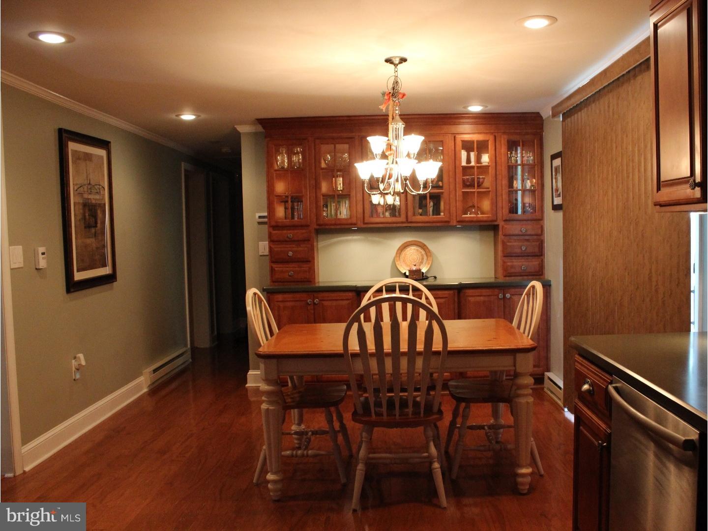 109 Prospect Road Sicklerville, NJ 08081 - Photo 8 of 20 a view of a dining room with furniture and chandelier
